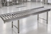 Transportadores de rodillos por gravedad: cómo optimizan una planta industrial. Imagen destacada sobre transportadores de rodillos. publicada en Diseño Web Rosario